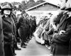 Anti-tour protesters and police officers face off in Dunedin