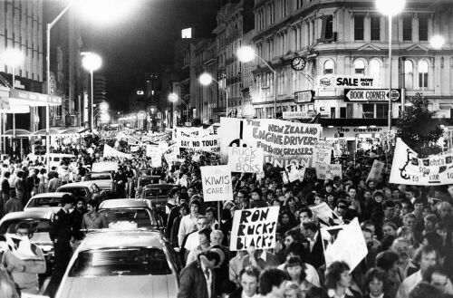 Anti-tour protesters march down Queen Street during a public demonstration in Auckland