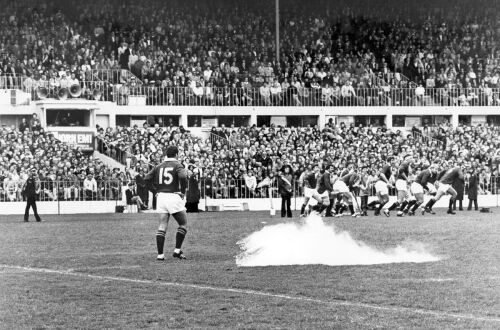 Springbok fullback Gysie Pienaar narrowly missed by a flour bomb during a match at Eden Park