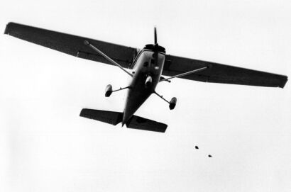 The Cessna plane drops flour bombs onto field at Eden Park