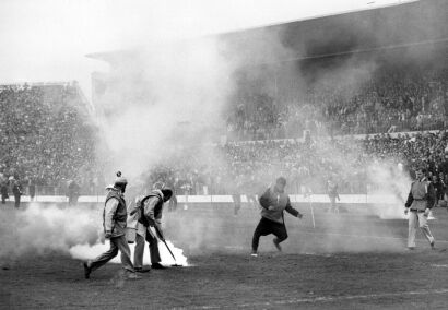 Marshals move smoke bombs at Eden Park after airplane flour bombing