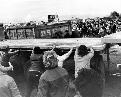 Protesters tamper with truck during a demonstration