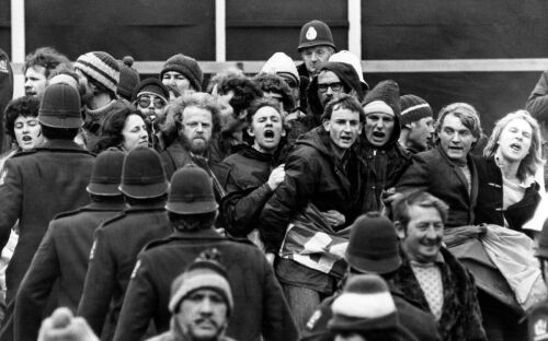 Protesters and police officers clash outside Eden Park