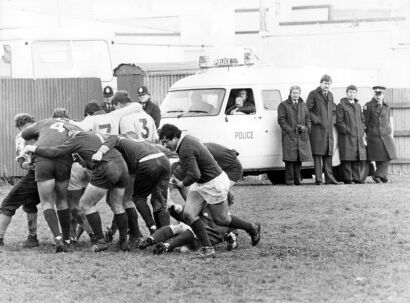 Players rush to assist a teammate who was injured during protestor confrontation