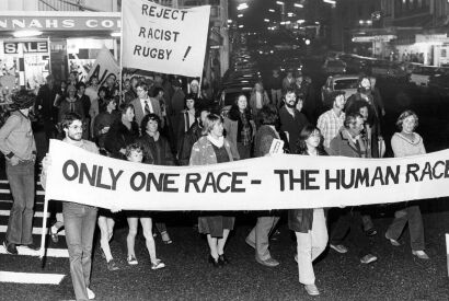 Anti-tour protesters march along New Plymouth's Devon Street