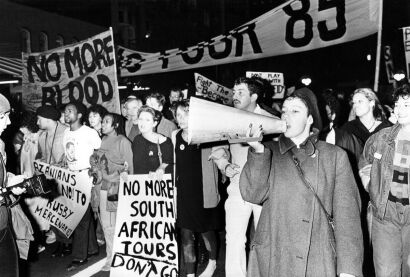 Protesters gathered in the street with loud-speaker for the No Tour March in Auckland