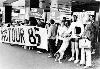 Protesters gathered for a demonstration against ASB backing schoolboy rugby at the main branch on Queen Street