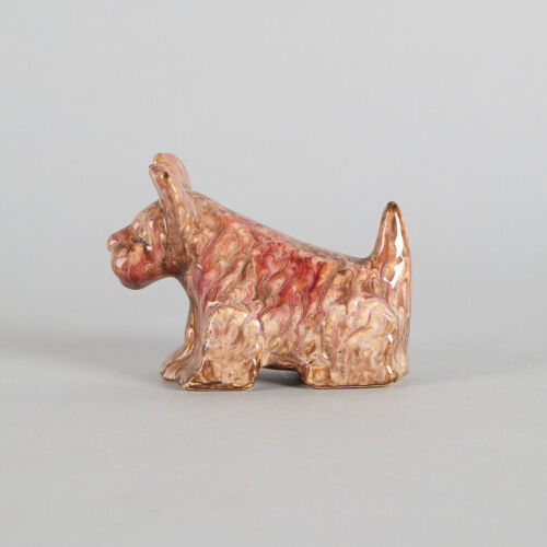 An Early Crown Lynn Trickle Glaze Scottie Dog