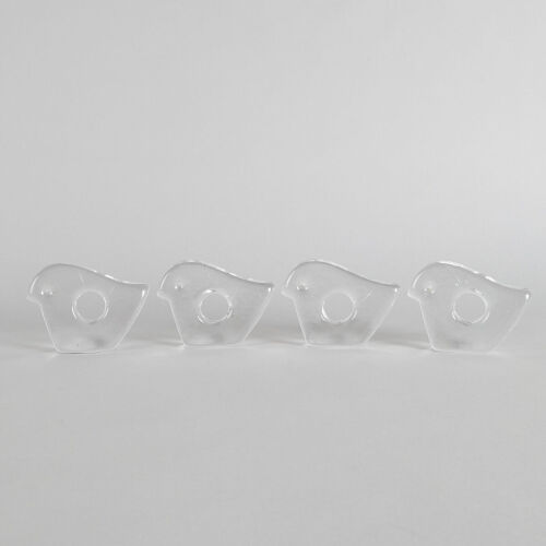 A Set of Four Pukeberg Glass Napkin Holders