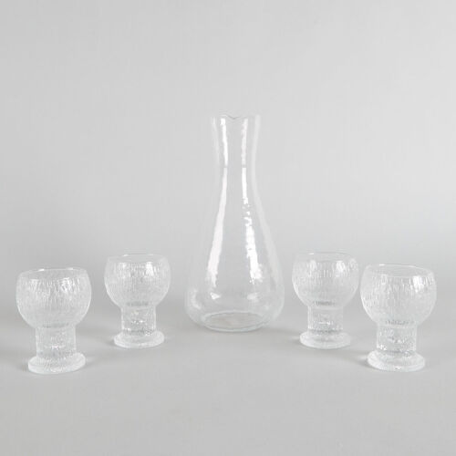 A Pukeberg Glass Decanter and Four Glasses