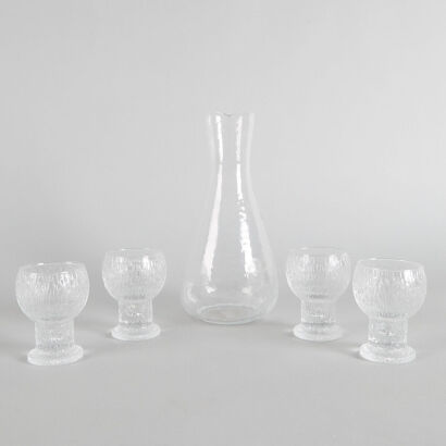 A Pukeberg Glass Decanter and Four Glasses