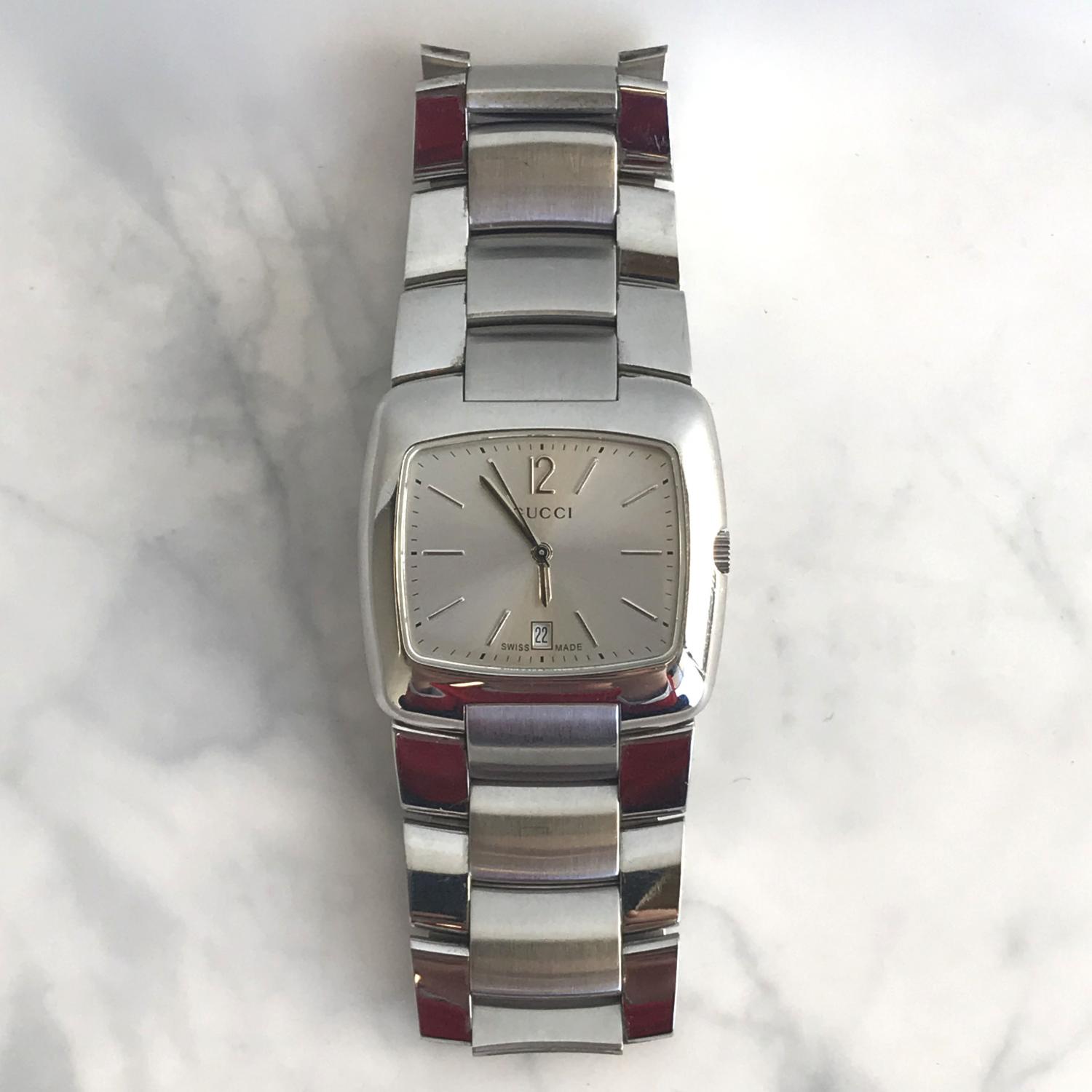 A Stainless Steel Gucci Estimate: $60 - $90