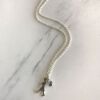 A Large Sterling Silver Runaway Girl Pendant by Karen Walker