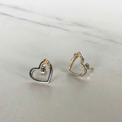 A Pair of Karen Walker Heart Stud Earrings