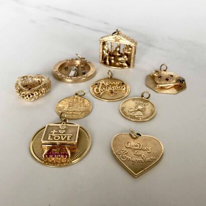 18/14ct Nine Assorted Charms