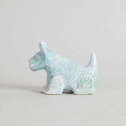 An Early Crown Lynn Trickle Glaze Scottie Dog