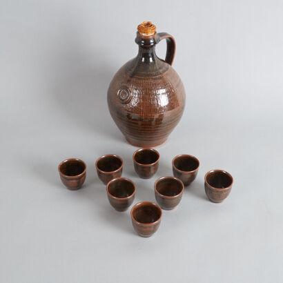 A Large Mirek Simse Wine Carafe with Set of Eight Yunomi