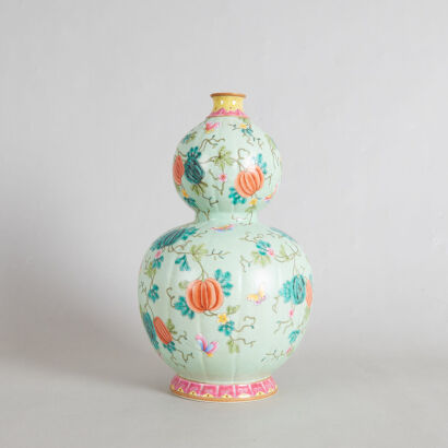 A Chinese Famille Rose 'Melon and Butterfly' Double-Gourd Vase (Da Qing Qianlong Nian Zhi Mark)