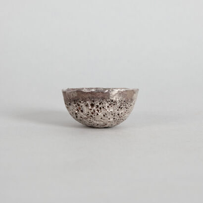 A Chinese Round Silver Bullion