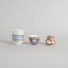 Seven Chinese Saucers & A Chinese Famille Rose Cup & A Japanese Imari Lidded Jar