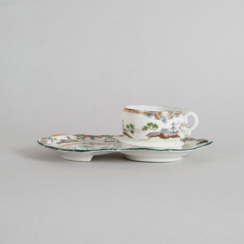 A Japanese Kutani Cup and Saucer