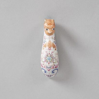 A Chinese Famille Rose 'Dragon' Belt Hook (Qianlong Nian Zhi Mark)