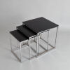 A Set of Glass and Chrome Nesting Tables - 2