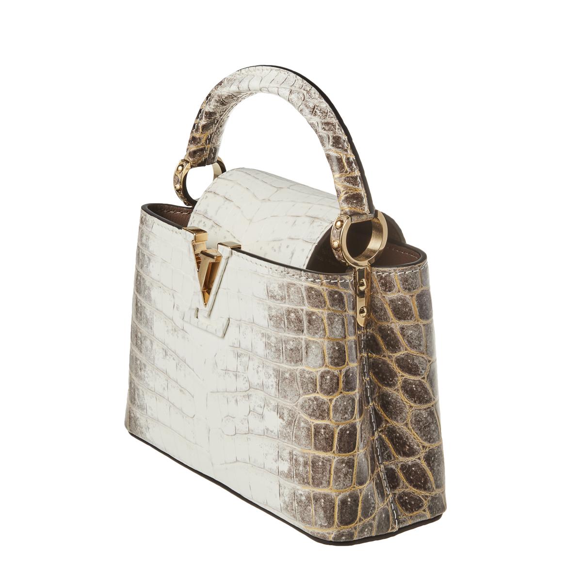 Webb's - The Louis Vuitton Exotic Leathers Collection includes lizard,  python, crocodile and ostrich leathers. Of these, crocodile leather is  regarded as the most precious and exclusive of the collection. At present