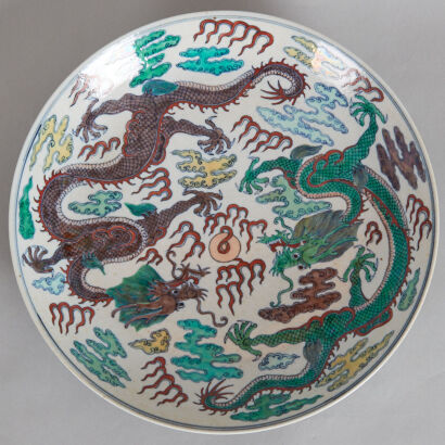 A Chinese Underglaze-blue and Doucai 'Twin Dragon' Charger (Da Qing Qianlong Nian Zhi Mark)