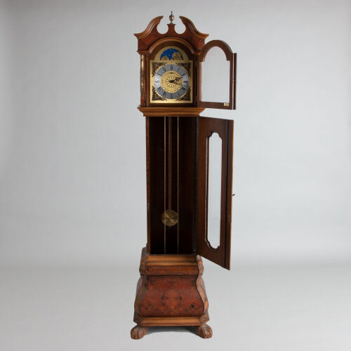 A Walnut Grandfather Clock with Moon Dial