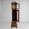 A Walnut Grandfather Clock with Moon Dial