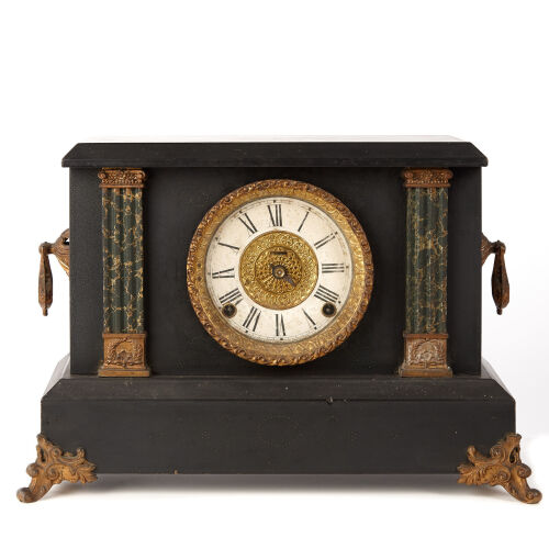 An Ingraham American Marbelised Wood Clock