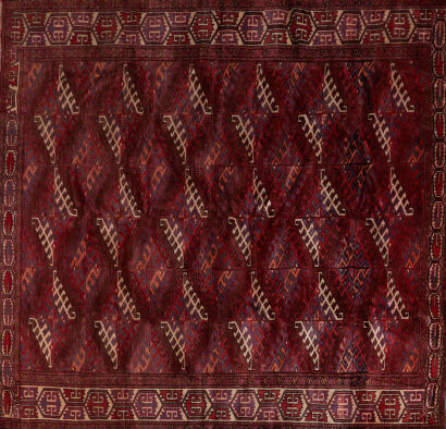 A Wool Knotted Pile Persian Turkmen Carpet