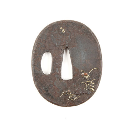 An Early-Edo Period 17th Century Oval Iron Tsuba