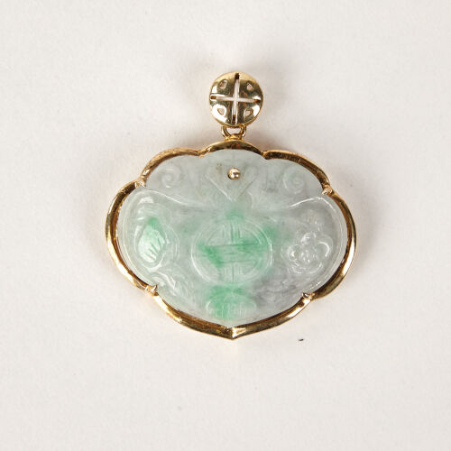 A 19th Century Jadeite Pendant in a Gold Setting