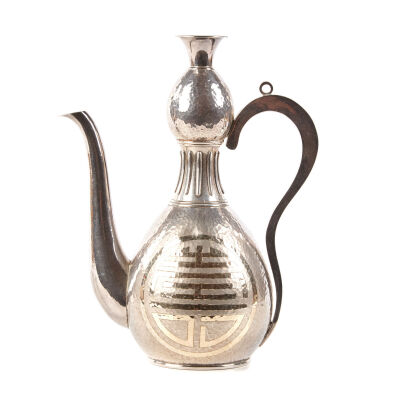 An Early-20th Century Oriental Silver Wine Pot