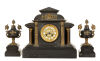 A 19th Century French Mantel Clock and Garnitures
