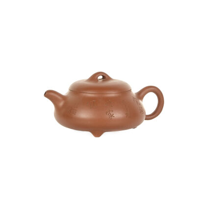 A Chinese Yixing Tea Pot with Three Feet