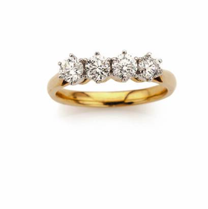 A Four Diamond Ring in White and Yellow Gold