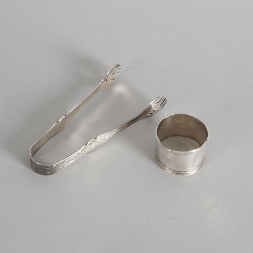 A Silver Pair of Ice Tongs and Napkin Ring