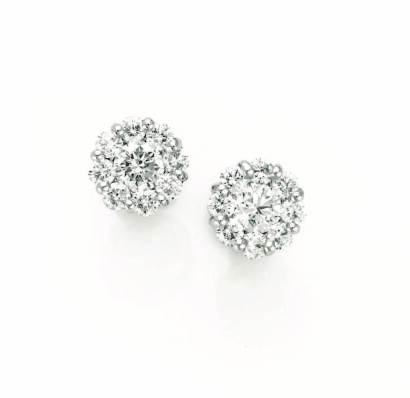 A Pair of White Gold and Diamond Cluster Stud Earrings