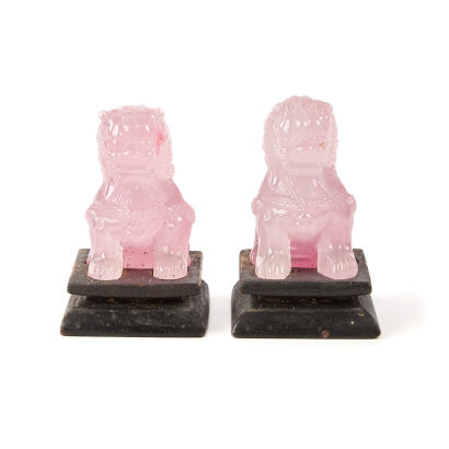 Two Pink Peking Glass Carvings Depicting Lions