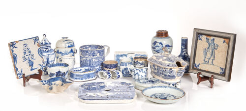 A Collection of 23 White and Blue Dishes