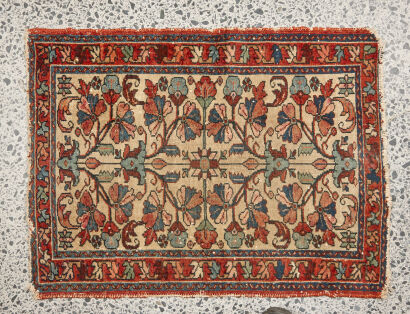 A Hand Knotted Rug with Floral Motif