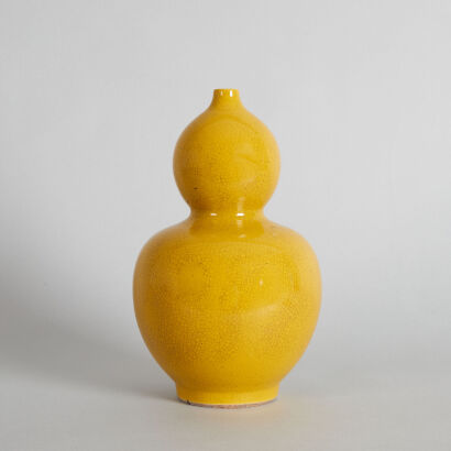 A Chinese Yellow-glazed Double-gourd Vase (Da Ming Tianqi Nian Zhi Mark)