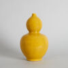 A Chinese Yellow-glazed Double-gourd Vase (Da Ming Tianqi Nian Zhi Mark)