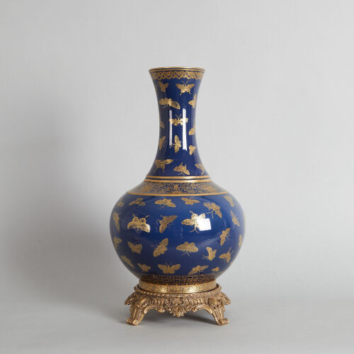 A Chinese Blue-ground Gilt-decorated 'Butterfly' Bottle Vase with bronze base (Da Qing Guangxu Nian Zhi Mark)