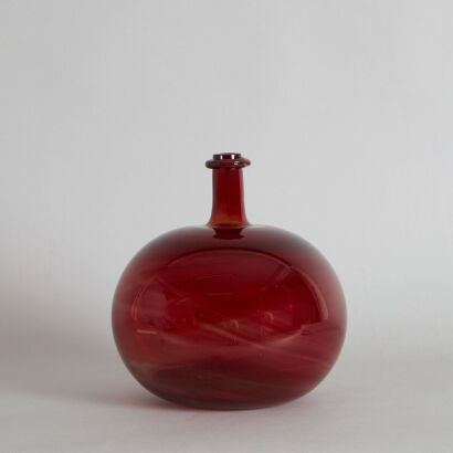 A Large Studio Glass Ruby Red Bottle Vase