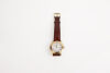 A Stainless Steel Gold-Plated Gucci Wristwatch