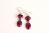 A Pair of Silver Ruby Drop Earrings